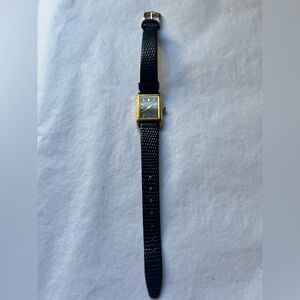 Women’s Black and Gold Seiko Watch
